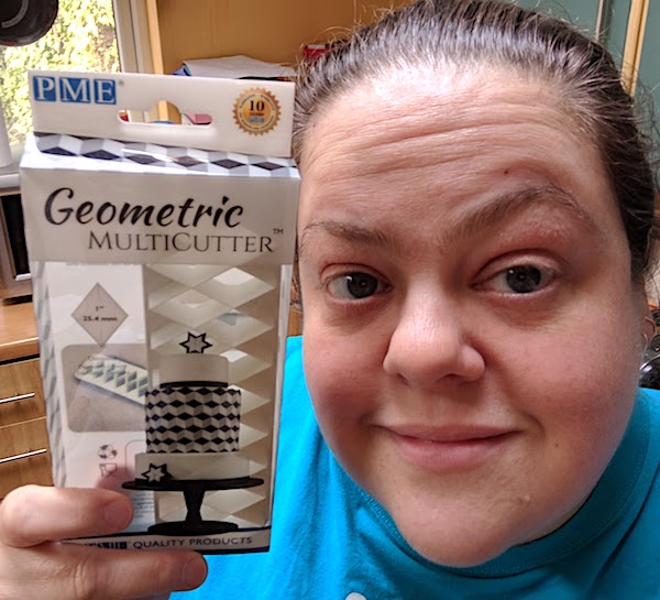 me holding a PME Geometric Multicutter